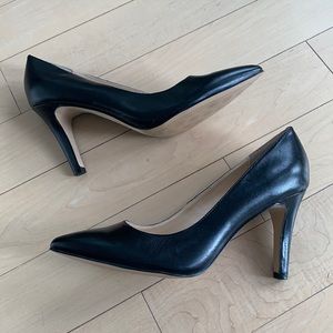 Isola NEW NEVER WORN black leather pumps.